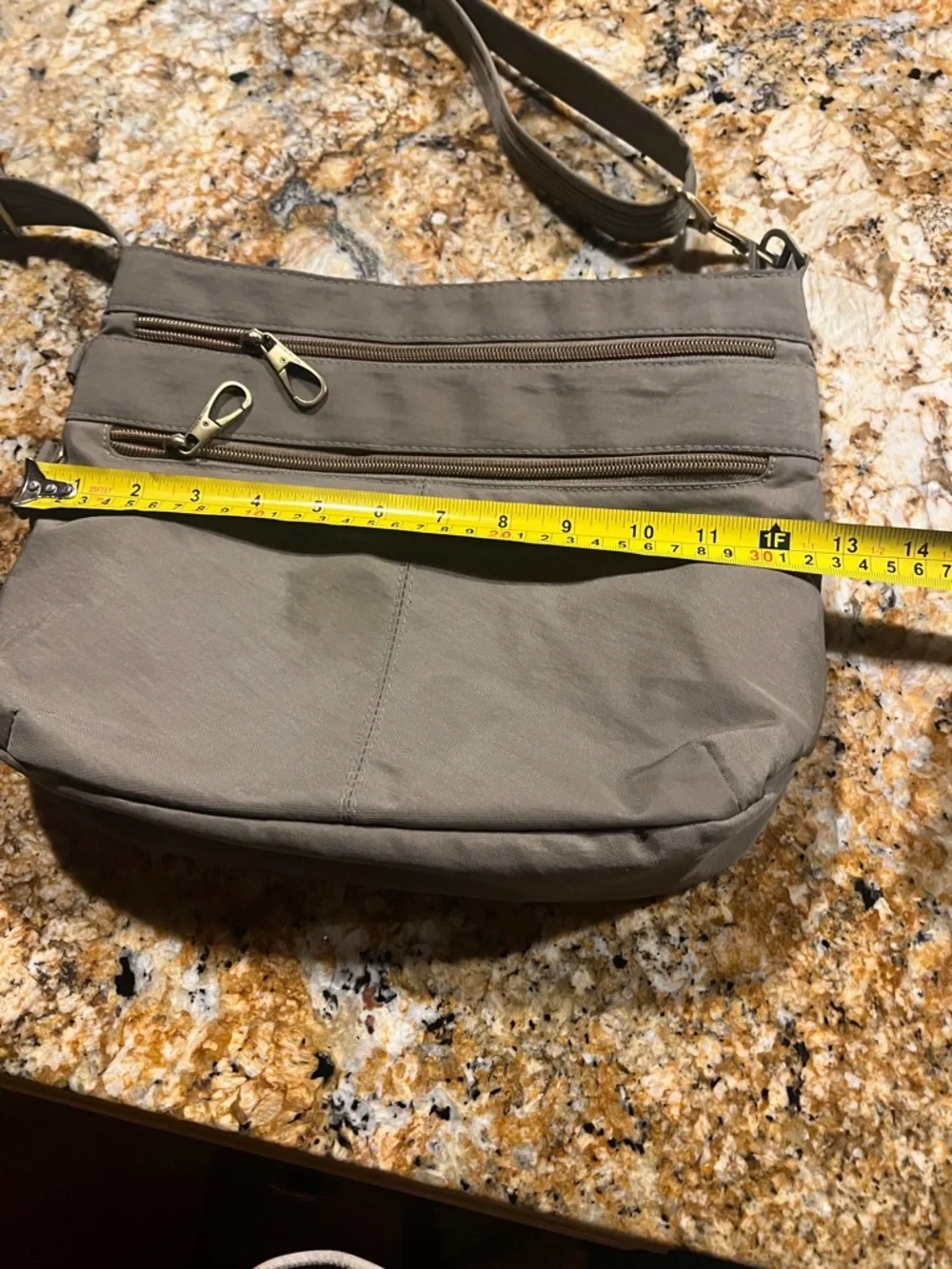 Travelon Men's Black and Silver Zipper Pull Crossbody Bag